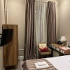 https://cdn-ostrovok-ru-ion.test.edgekey.net/t/100x100/hotel_review/b9/76/b9760adabc87d97fb5cc2390ad32c2698dcb6150.JPEG
