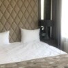 https://cdn-ostrovok-ru-ion.test.edgekey.net/t/100x100/hotel_review/bc/34/bc3468e53cf3715ea4778db9ab16b573e9c0183a.png