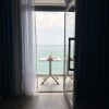 https://cdn-ostrovok-ru-ion.test.edgekey.net/t/100x100/hotel_review/c0/d0/c0d09acf10cd8799f8ab8417d1f1b1773aaa6100.JPEG