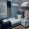 https://cdn-ostrovok-ru-ion.test.edgekey.net/t/100x100/hotel_review/c9/7c/c97c053955000ea5781ebbe9aa38e01c1026701c.JPEG