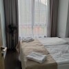 https://cdn-ostrovok-ru-ion.test.edgekey.net/t/100x100/hotel_review/ca/b0/cab0ee80776235aaf255caca8461dbfbddb09cfd.jpeg