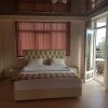 https://cdn-ostrovok-ru-ion.test.edgekey.net/t/100x100/hotel_review/d5/a0/d5a08a1347e416ccc2fa23882bcdde8d3cca1561.jpeg