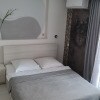 https://cdn-ostrovok-ru-ion.test.edgekey.net/t/100x100/hotel_review/dd/25/dd25554a091b807b2d6808eeb89ec7b1f1e05b81.JPEG