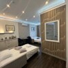 https://cdn-ostrovok-ru-ion.test.edgekey.net/t/100x100/hotel_review/e0/47/e04799585d10af247c0e3ca3ed357d887f949f8b.JPEG
