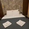 https://cdn-ostrovok-ru-ion.test.edgekey.net/t/100x100/hotel_review/e6/49/e6491a6f806499e2b19bdf8a6ab8142bc18cf39c.JPEG