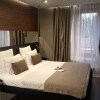 https://cdn-ostrovok-ru-ion.test.edgekey.net/t/100x100/hotel_review/ec/8b/ec8b1da104640942e30501c611c2d50fed61f8e3.JPEG