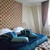 https://cdn-ostrovok-ru-ion.test.edgekey.net/t/100x100/hotel_review/ed/30/ed303ff2b554631d13eb6fc624bef981543300b8.JPEG