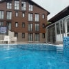 https://cdn-ostrovok-ru-ion.test.edgekey.net/t/100x100/hotel_review/ed/ab/edab06e51d04dd859bc15b16f577ae850df57c0a.JPEG