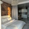 https://cdn-ostrovok-ru-ion.test.edgekey.net/t/100x100/hotel_review/f5/ec/f5ec22cc579a50cc4ef2c6e9f23e4b37dd527270.JPEG