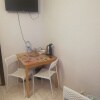 https://cdn-ostrovok-ru-ion.test.edgekey.net/t/100x100/hotel_review/f7/4c/f74cc8eb9b2e25cdeb08853b755ec175107dba7b.jpeg