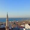 https://cdn-ostrovok-ru-ion.test.edgekey.net/t/100x100/hotel_review/fb/1b/fb1b5676d937061e5d46de2d92de543715b75978.JPEG