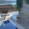https://cdn-ostrovok-ru-ion.test.edgekey.net/t/100x100/hotel_review/fe/4d/fe4db7f382c3a882820bc863778dd46b46a430dd.JPEG