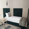 https://cdn-ostrovok-ru-ion.test.edgekey.net/t/100x100/hotel_review/fe/bd/febdef3f936b1244895c172e5f1935c0fec29d40.jpeg