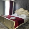 https://cdn-ostrovok-ru-ion.test.edgekey.net/t/100x100/hotel_review/ff/52/ff5297b36f6ba0aca7e6042f1527f55e5939d786.JPEG