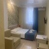 https://cdn-ostrovok-ru-ion.test.edgekey.net/t/100x100/hotel_review/zz/27/ad2779bf8fff2dadd5f535695ad820de7374202e.JPEG
