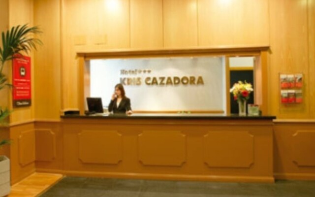 Kris Cazadora