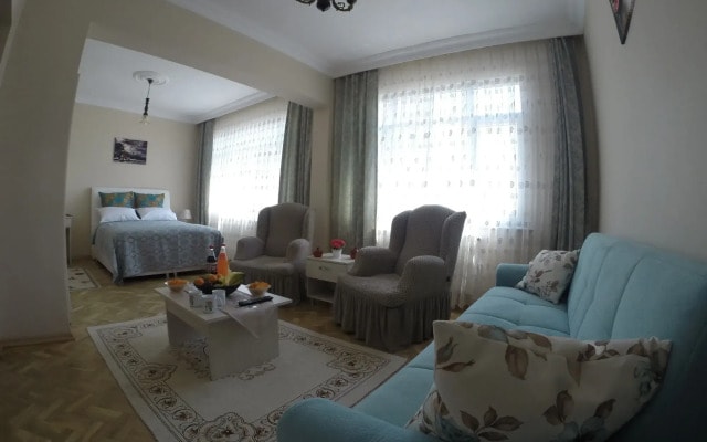 Atam Hotel & Suites