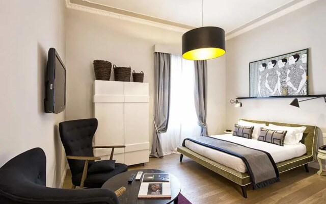 Отель The Independent Suites