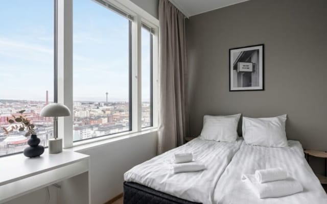 12th Floor Sauna Retreat with Stunning City Views