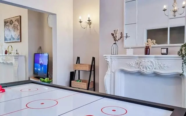 White Cozy House With Pool Table Game Room