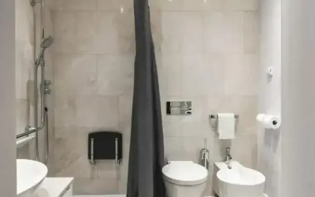 Design Central Studio Apartment with Balcony by Hostlovers