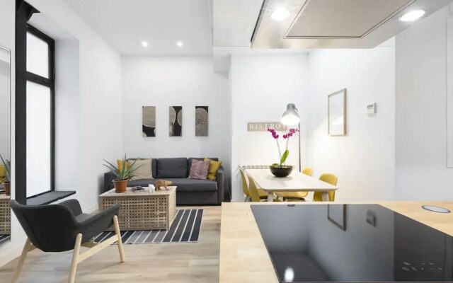 Atocha Apartment by FlatSweetHome