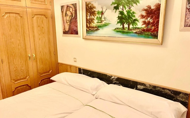 Apartamentos Suites Torr Av América - López de Hoyos