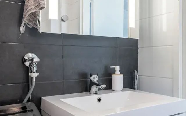 Modern 1BR Home with Sauna & Balcony
