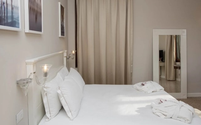 Отель IH Hotels Venezia Salute Palace