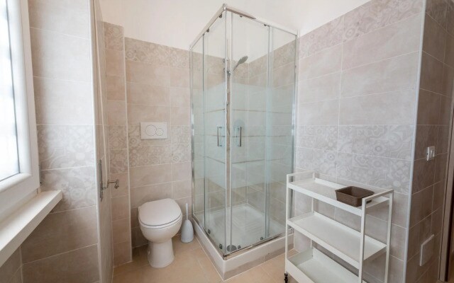 Casa Rosa Beige e Blu