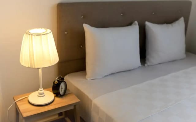 Guzi Rooms & Suites