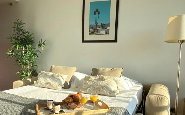 1610B - Stunning studio with Champs Elysées Views!