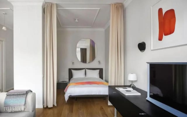 Design Central Studio Apartment with Balcony by Hostlovers