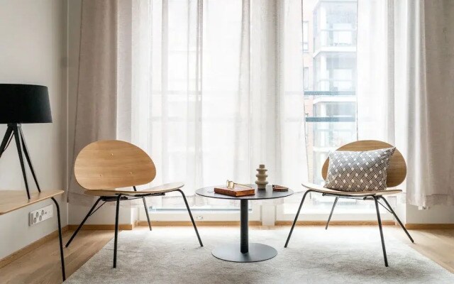 Bright studio by Logomo & Train station