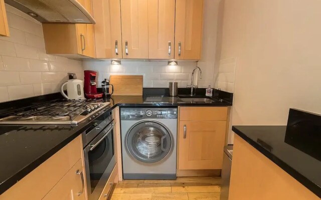 JOIVY Charming 1-Bedroom Flat with Patio