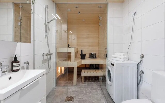 Modern 2BR Apartment with Sauna & Large Balcony