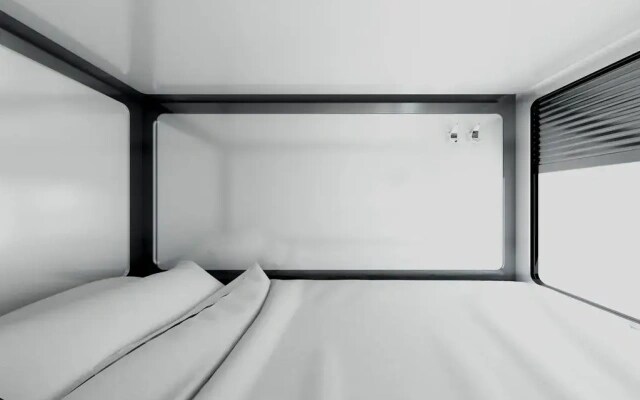 Капсульный Отель Qube