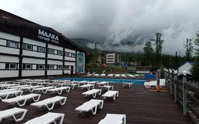 Отель Malca