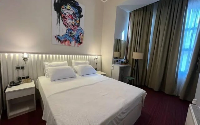 Отель Rafinn Hotel