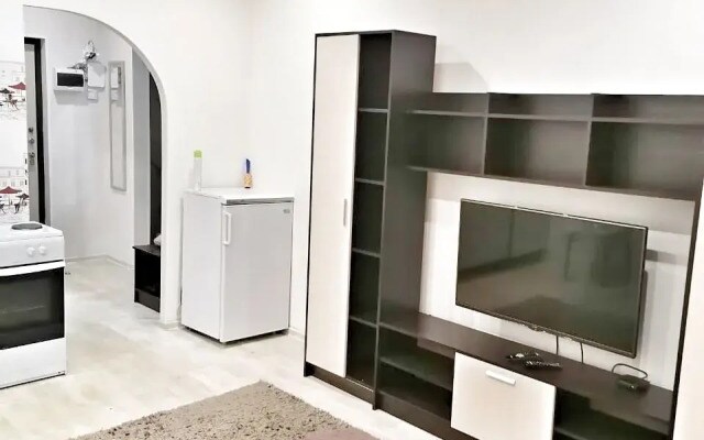 Квартира Уютная студия рядом с ТРЦ АУРА