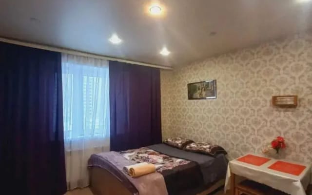 Квартира Уютная студия на Курыжова 32