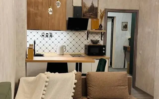 Квартира Красивая и уютная студия в тихом районе