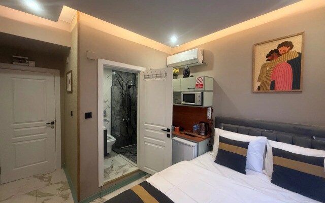 Апартаменты Warm cozy studio near the metro station