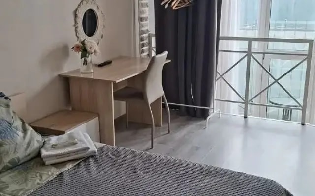 Апартаменты Уютные с Балконом