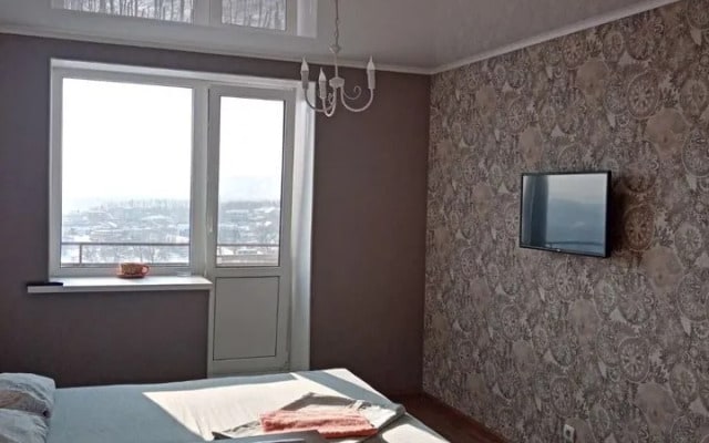 Квартира c фантастичеcким паноpaмным видoм на гopoд